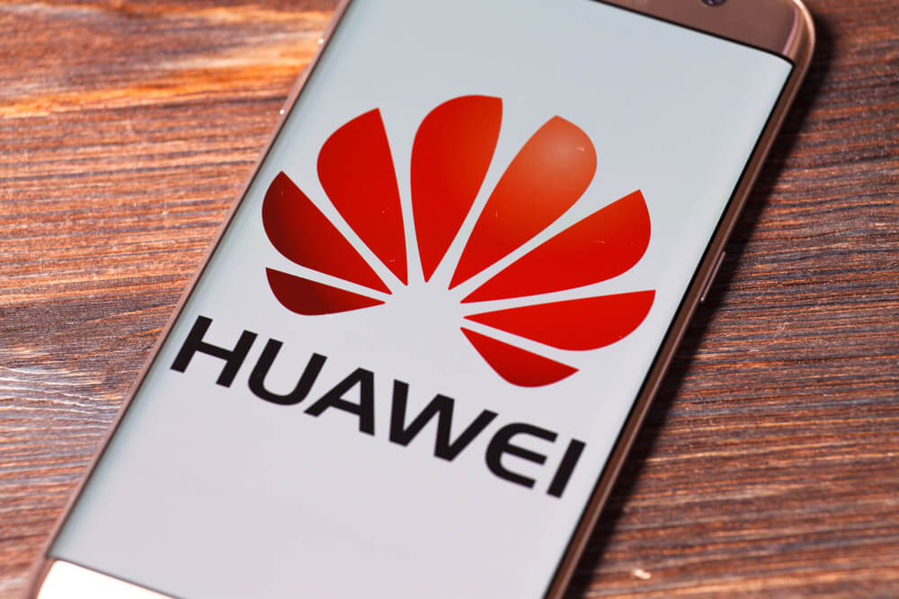 Huawei logo on screen of phone.