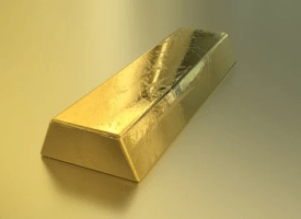 Gold Drops but Prepares for a Weekly Gain