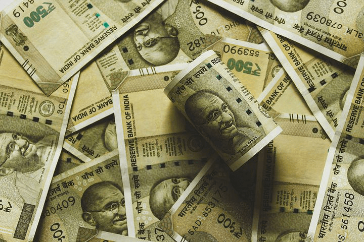 Indian rupee escapes record lows